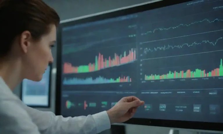 Person analyzing data charts on a digital dashboard with teamwork in the background.