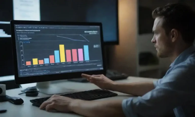 Person analyzing graphs and metrics on a computer to enhance content strategy.