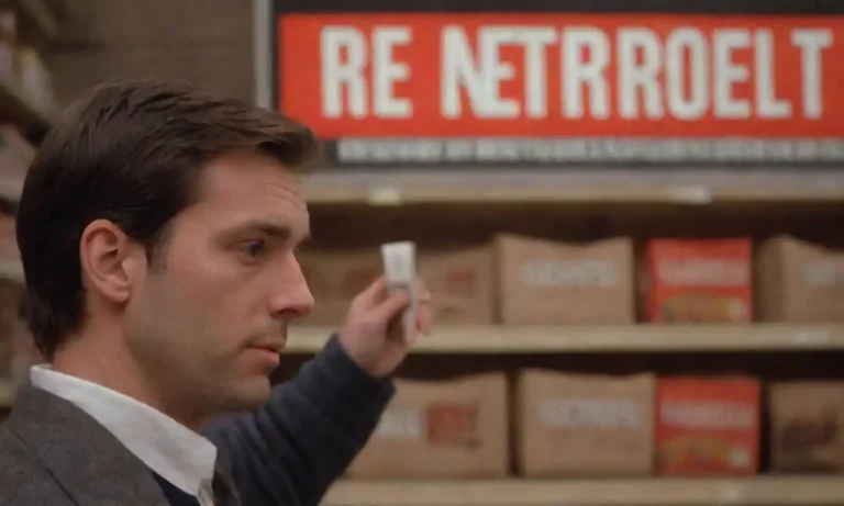 A shopper contemplating a returned product in front of a stores return policy sign.