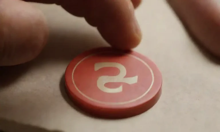 Close-up of a person examining a trademark symbol on a product