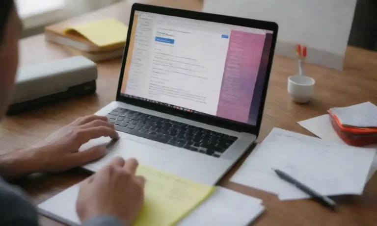 A person writing persuasive text on a laptop