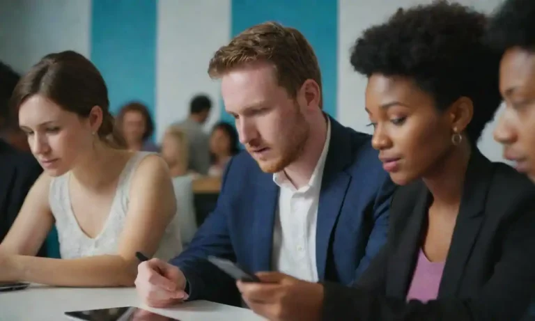 A diverse group of people engaging through smartphones and laptops